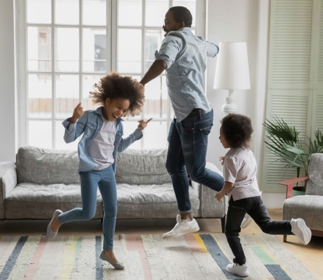 Family playing in living room