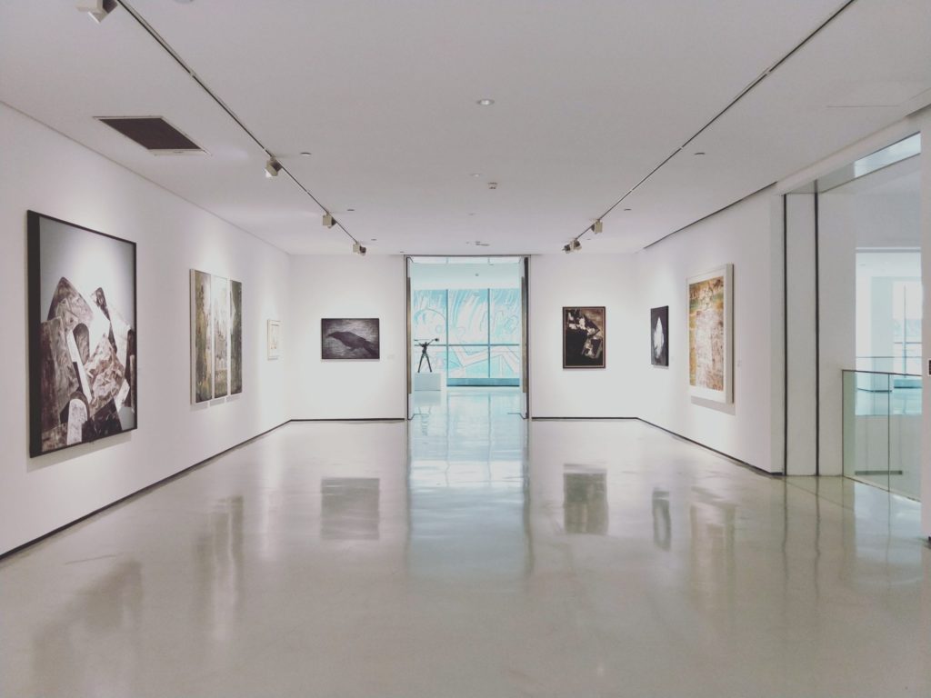 Museum gallery, with art hung on walls