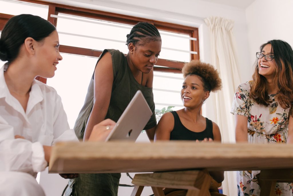 Women having a discussion at a table