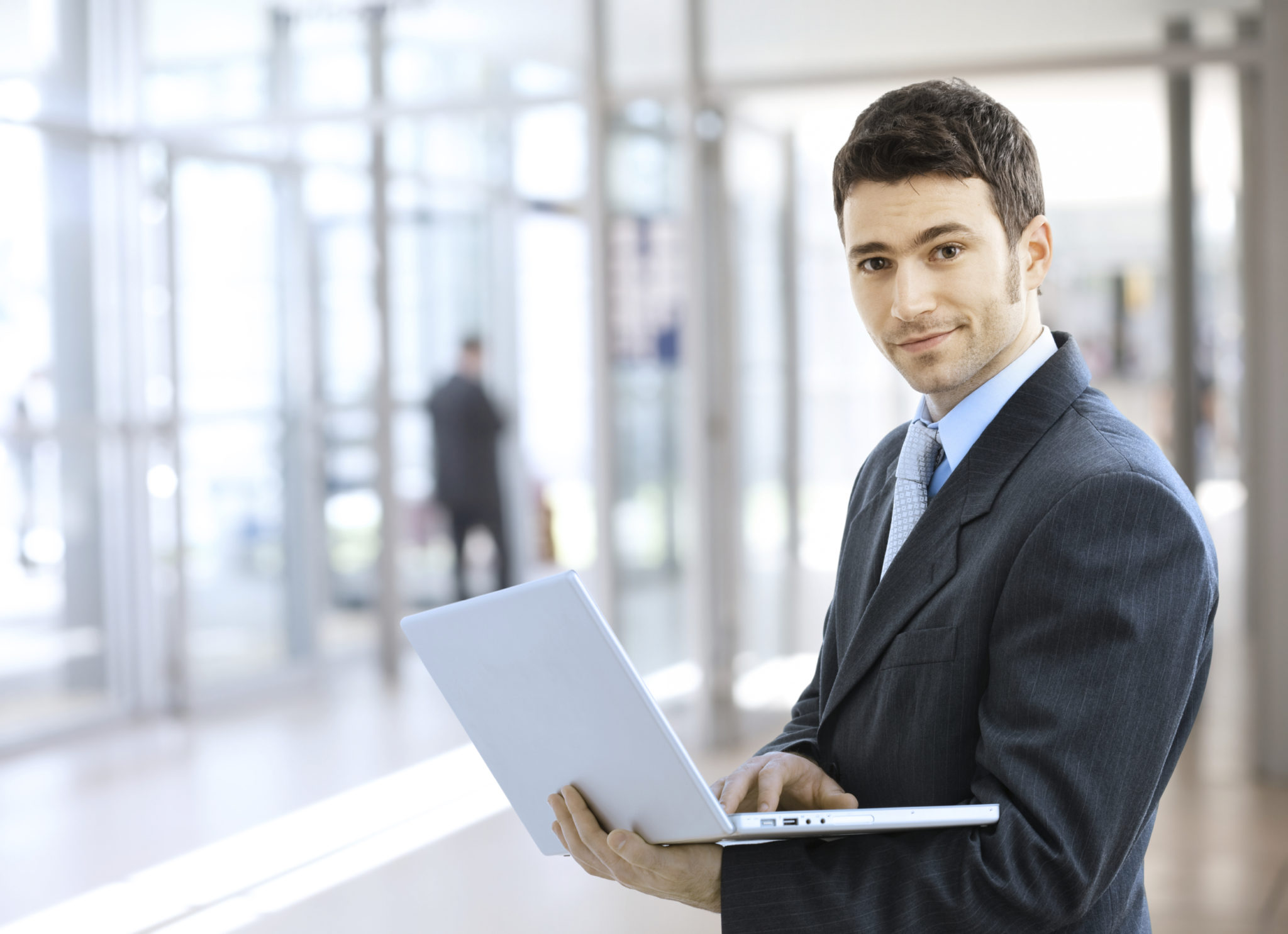 Businessman using laptop man at the office using a computer